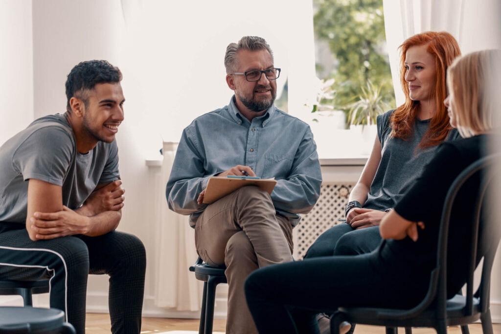 group of therapist meeting for a discussion in their office